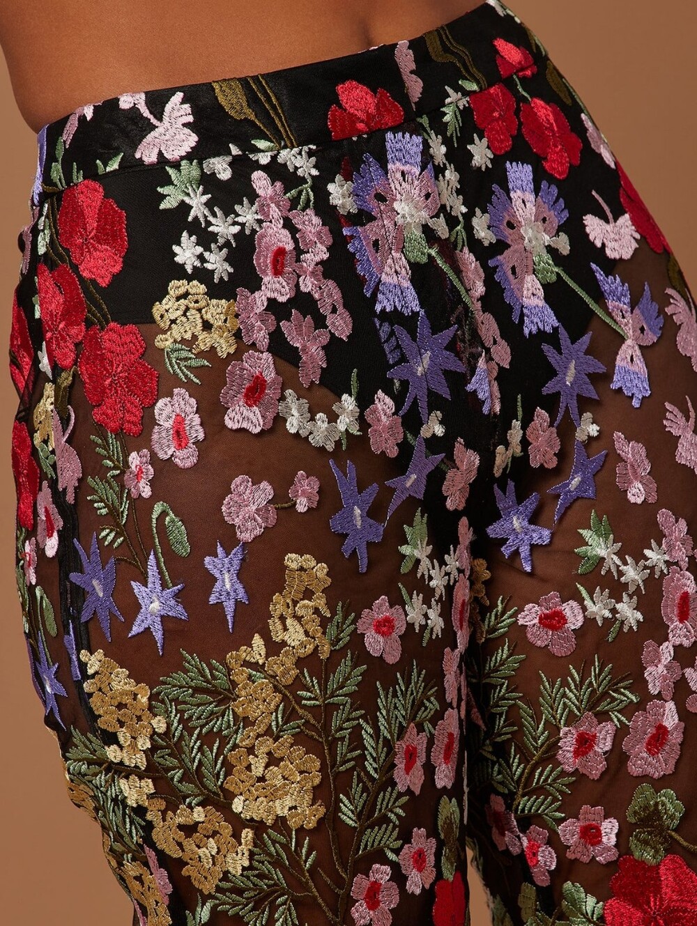 An elegant and bold women's two-piece trouser suit made of transparent black - Picture 2 of 2